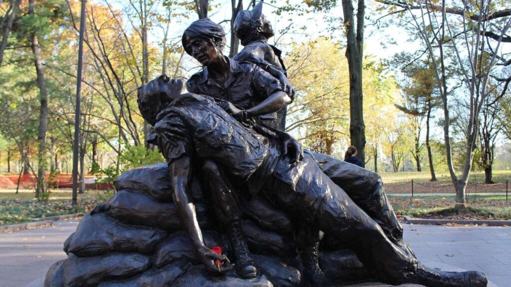 An outdoor sculpture of women nurses caring for a soldier